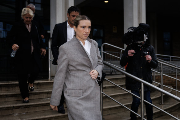 Kerr’s partner Kristie Mewis leaves court.