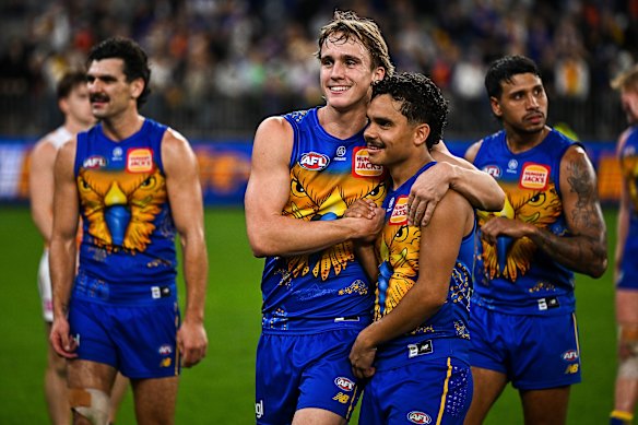 Hamish Davis and Malakai Champion celebrate the Eagles’ win on Sunday.
