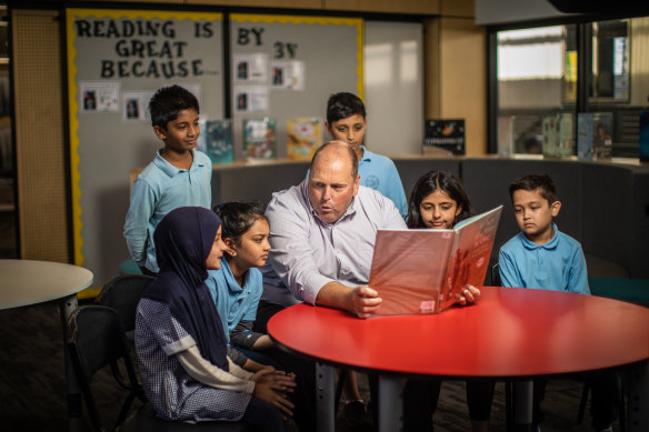 Dandenong North Primary School principal Paul Hilton with year 5 students. 