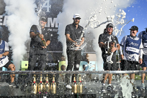 Dustin Johnson sprays champagne after his 4 Aces team won LIV Golf Adelaide.