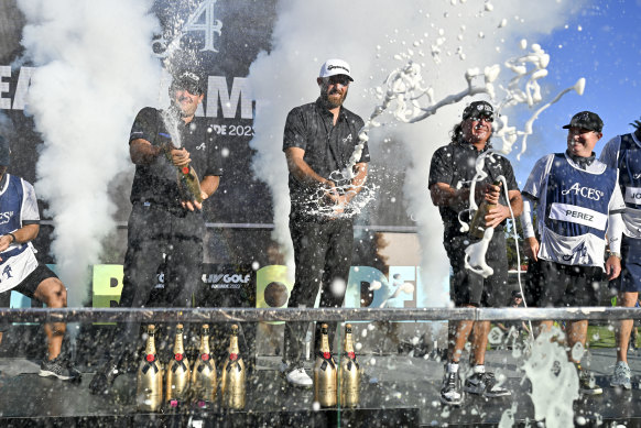 Dustin Johnson sprays champagne after his 4 Aces team won LIV Golf Adelaide.