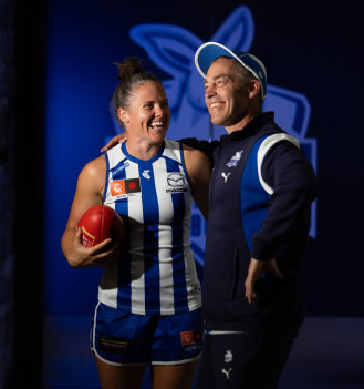 North Melbourne captain Emma Kearney with men’s coach Alastair Clarkson