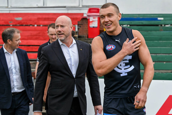 Carlton president Luke Sayers (left) was told of Tax Office concerns that PwC may have misled Treasury over foreign investment approvals in 2019 when he was chief executive of the firm. 