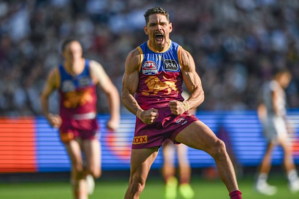 Charlie Cameron celebrates during the AFL grand, where Brisbane defeated Geelong.