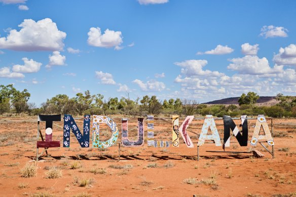 Indulkana’s Hollywood-style sign, decorated with Indigenous motifs.