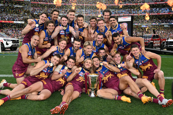 The Brisbane Lions lap up their premiership win.