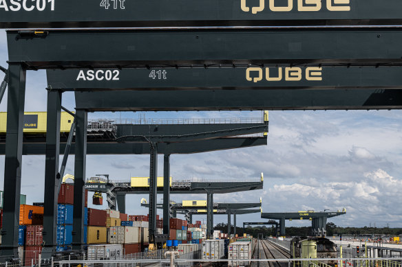 Trains carrying containers shuttle between Qube’s import-export terminal at Moorebank and Port Botany.