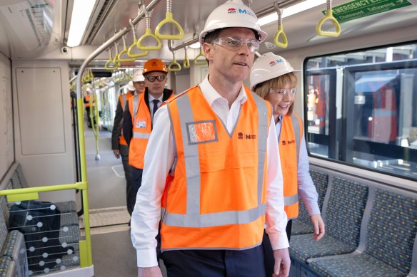 Premier Chris Minns and Transport Minister Jo Haylen board a new metro train which is undergoing testing on the main section of the City and Southwest line.
