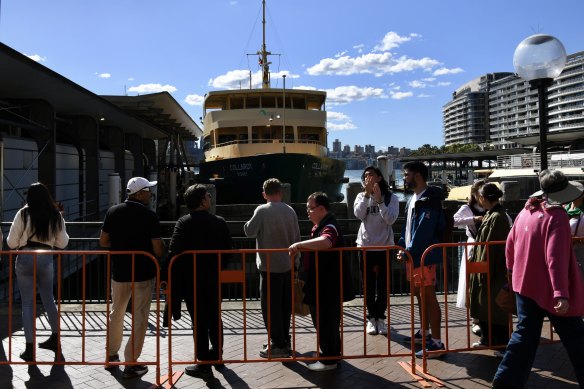 People queue on Sunday at Circular Quay for the Collaroy ferry, whose future remains in doubt.