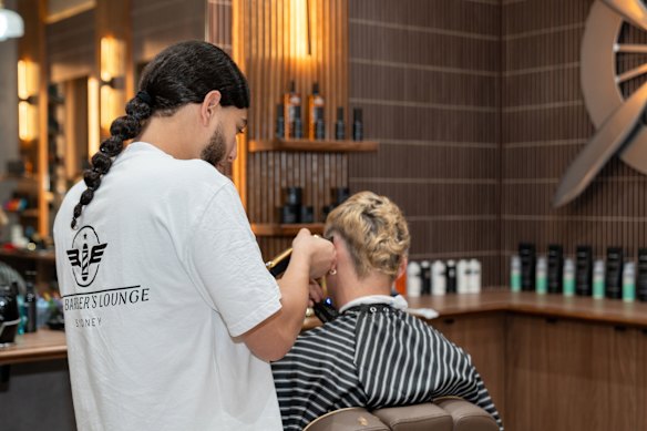 May as well fill that time to kill … a haircut at the airport.