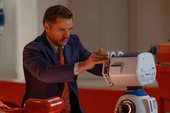 Pedro Pascal with H.E.R.B.I.E in The Fantastic Four: First Steps.