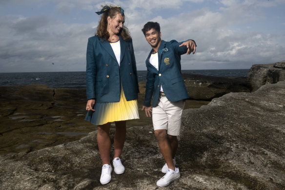 Water polo player Tilly Kearns and breakdancer Jeff Dunne show off their opening ceremony uniforms.