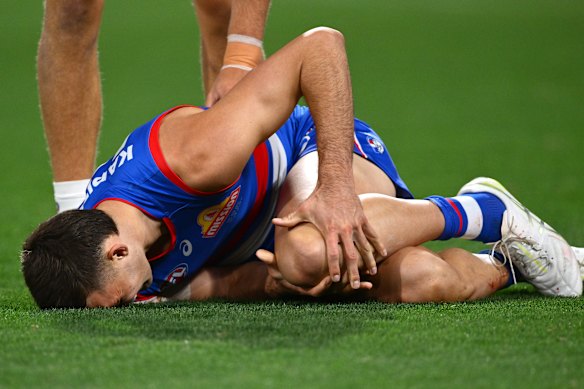 Sam Darcy in agony after rupturing his ACL.