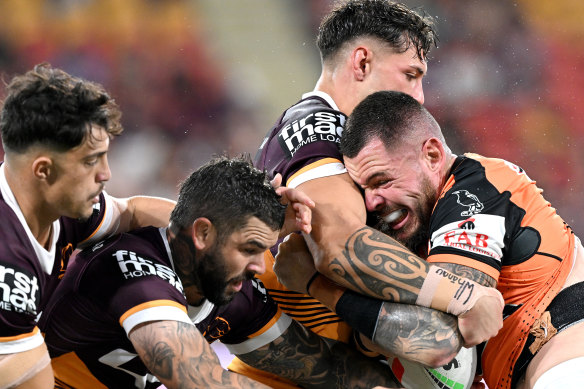 Tigers forward David Klemmer meets a Broncos defensive brick wall.