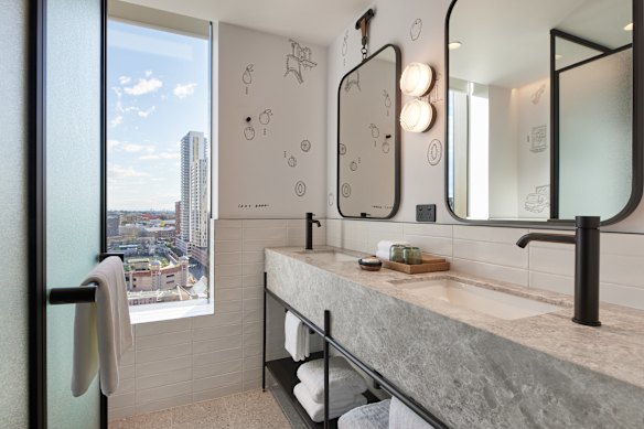 Playful scribbles on the bathroom wall.