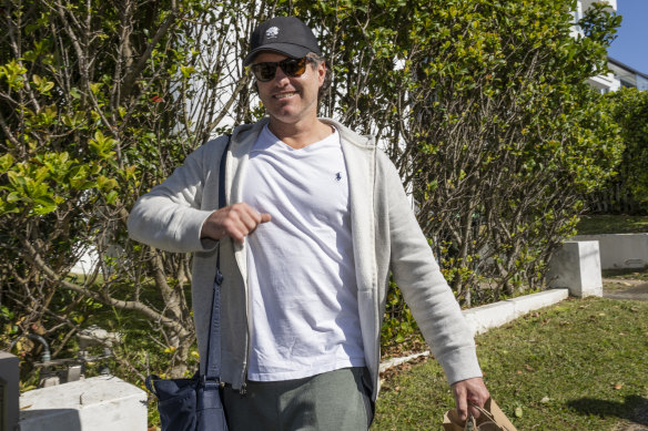 Helen Coulston's husband returning to the family's Dover Heights home on Tuesday.