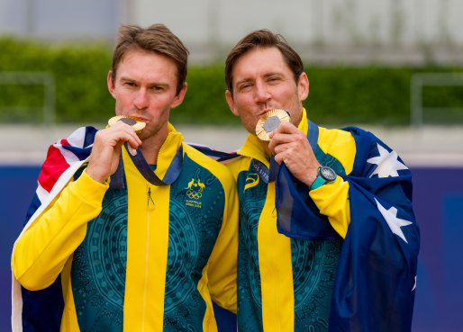 John Peers and Matthew Ebden with their Olympic gold medals at Roland Garros.