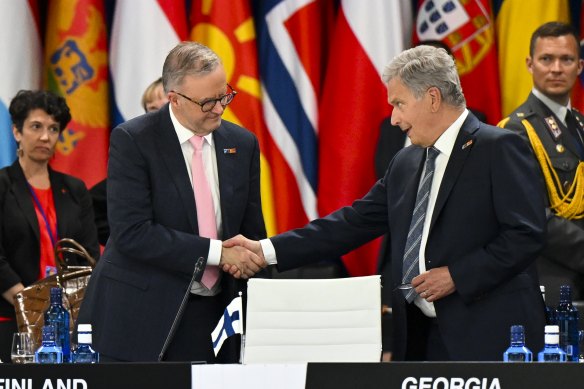 Anthony Albanese greets President of Finland Sauli Niinisto as they attend the North Atlantic Council meeting at the Nato Leaders’ Summit in Madrid, Spain.