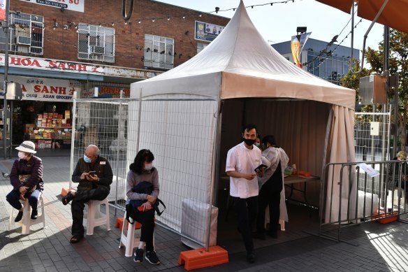 Cabramatta pharmacist Quinn On runs two pharmacies, both offering walk-in AstraZeneca vaccine shots. 