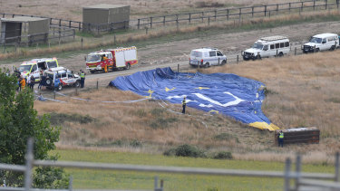 Police and paramedics at the scene of the balloon accident.