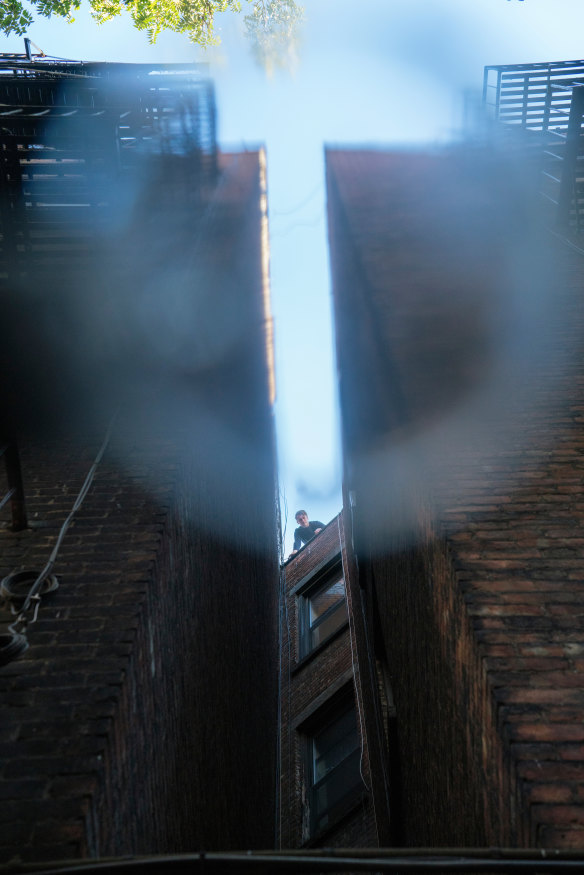 Knott surveys the air shaft he fell down: "The fall was further than I recalled," he says.