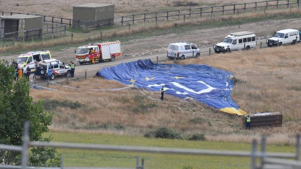 Police and paramedics at the scene of the balloon accident.