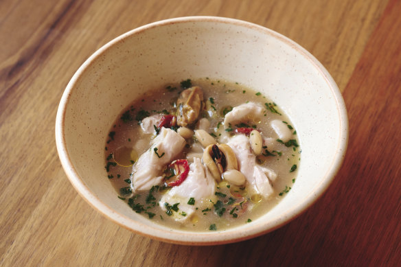 Fish in crazy water with mussels, herbs and semi-dried tomatoes.