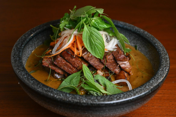 Green curry with charcoal-grilled eggplant and optional brisket.