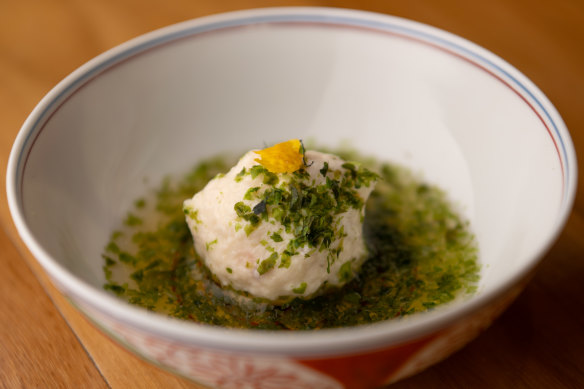 Scallop fishcake with sticky seaweed sauce on yuzu.