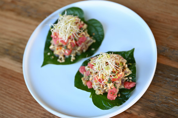 Betel leaves with tuna, pomelo and grapefruit.