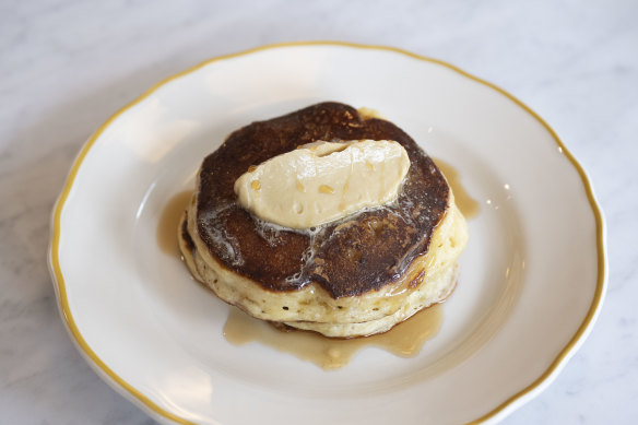 Ricotta and cacao husk pancakes with smoked maple syrup and espresso butter at Flora. 