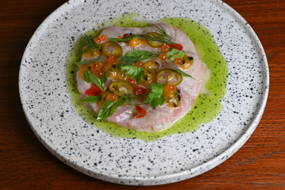 Kingfish sashimi in coconut-and-galangal broth with passionfruit dressing.