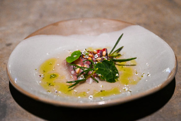 Go-to dish: Hiramasa kingfish crudo with tomato consomme and sea herbs.