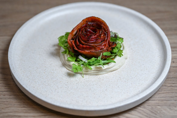 Cashew cream adds richness to a rosette of grilled ox tongue.