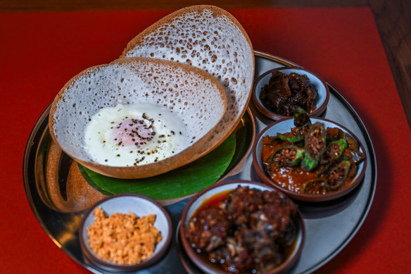 Scoop up curries (such as pork and okra) and sambols with bowl-shaped pancakes, known as hoppers.
