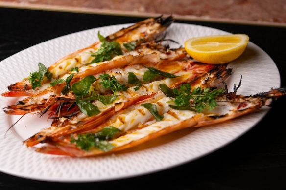 King prawns with bisque butter and curry leaves.