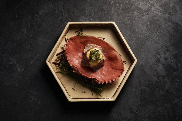 A trio of shellfish with scampi jelly and sweetcorn sauce.