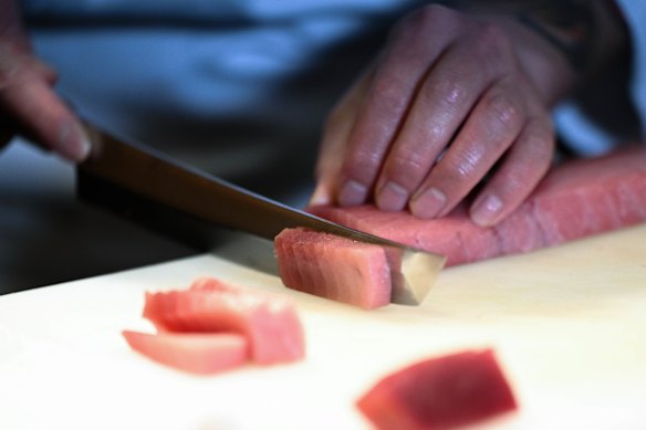 For sashimi, cut the fish on a slight angle.