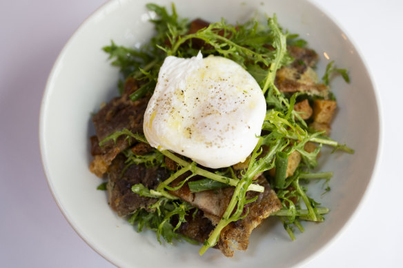 Salade Lyonnaise with confit duck, slab bacon and poached egg.