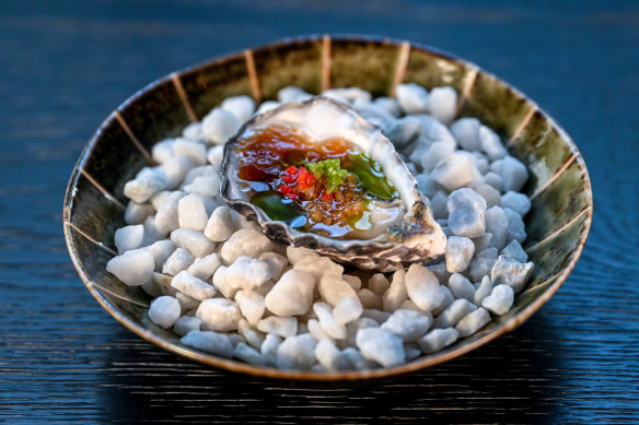 Pacific oyster with bonito jelly, white onion salsa and apple granita.