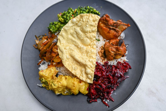 White rice; kale mallum; chicken, beetroot and cassava curries; pappadum.