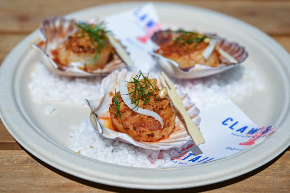 Scallops with spicy ’nduja and pine nut crumb.