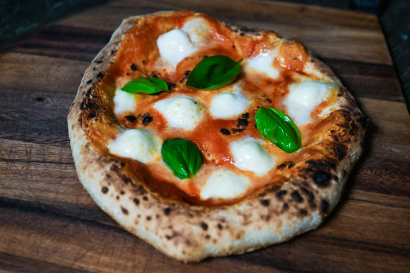 Home-made pizzas get properly charry in the portable ovens.