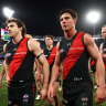 Dejected Essendon players after the club’s loss to Geelong.