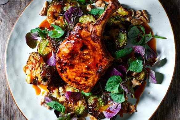 Hot sauce pork chops with crispy Brussels sprouts.