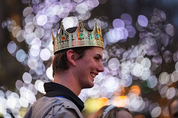 A fan waits in line to enter B.C. Place stadium for the opening night of the Taylor Swift Eras Tour concert, in Vancouver, British Columbia. 