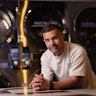 Omer Tas, founder of Sydney laundromat chain Stacks Laundry, in the Harris Park store.