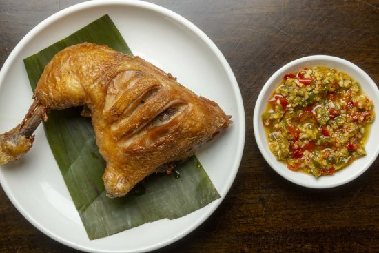 Deep-fried chicken thigh with hot oil garlic sambal.