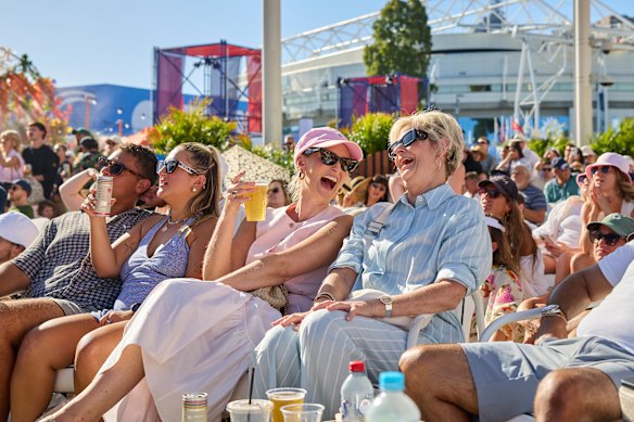 Settle in to watch the tennis and get food from one of the surrounding vendors.