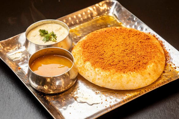 Ruchi Ghee Pudi Thatte Idli (fluffy idli pancake with chutneys).